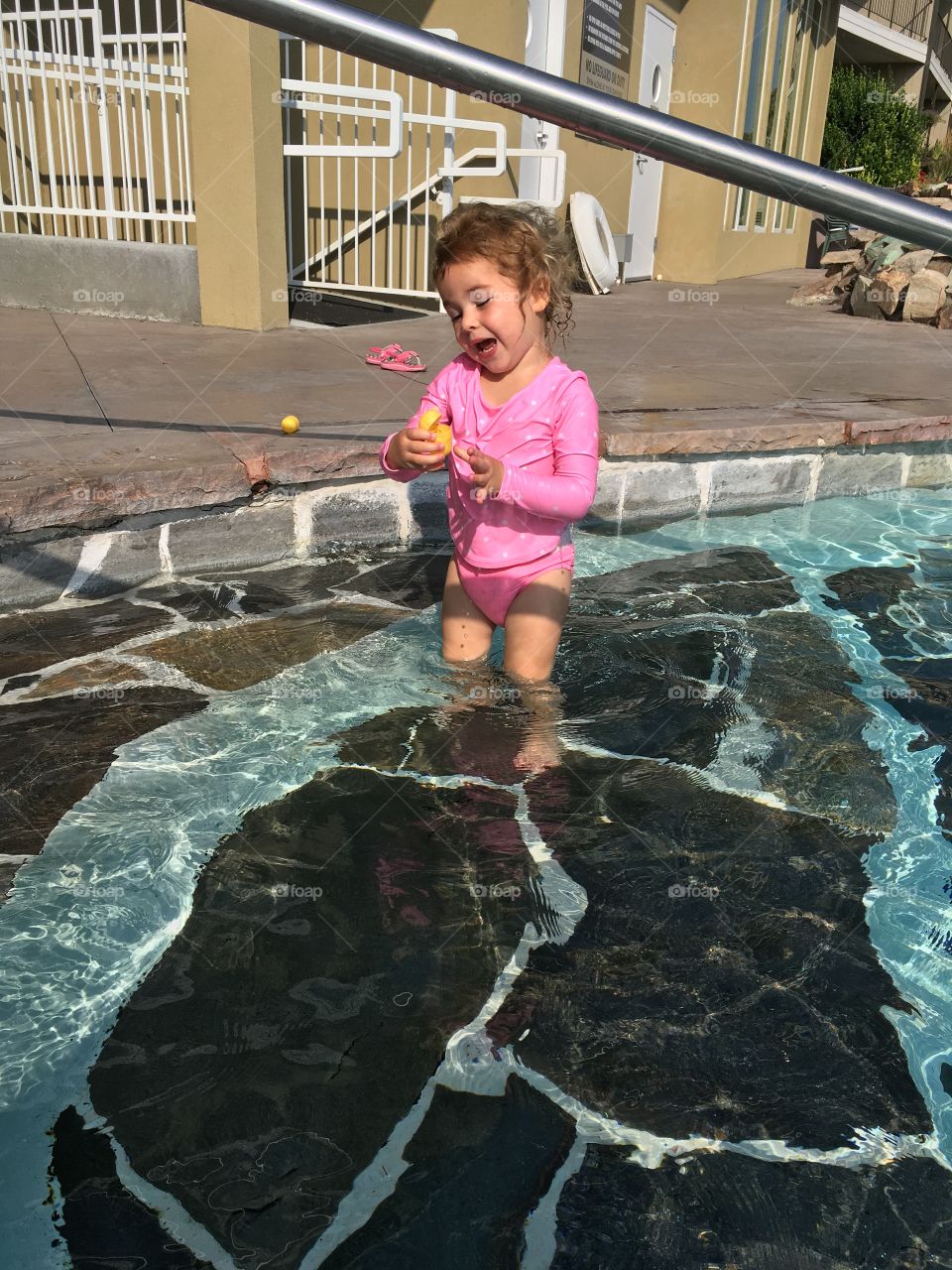 Singing in the pool.