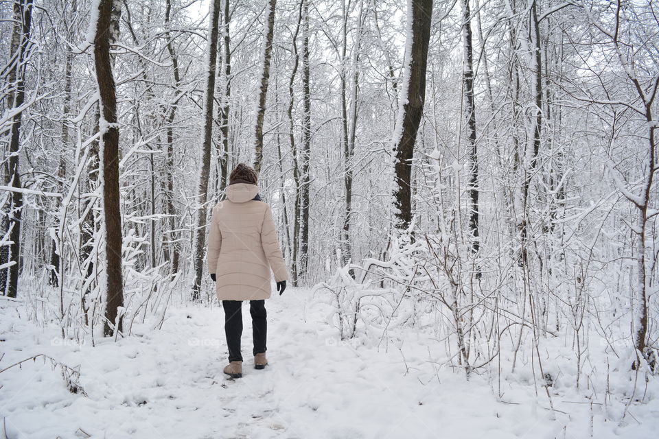 morning walking woman in winter park