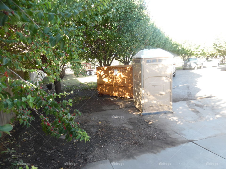 Outhouse and trash bin