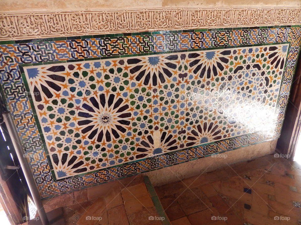 The mosaic tiled walls of Alhambra in Granada, Spain 