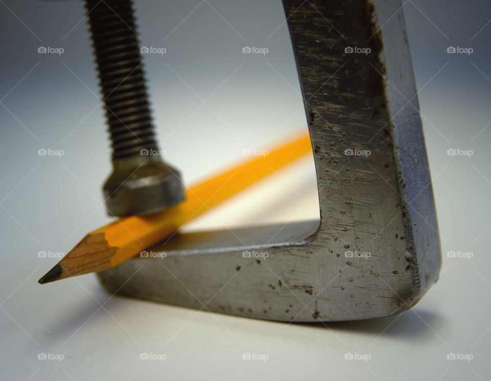 Clamped pencil in close-up