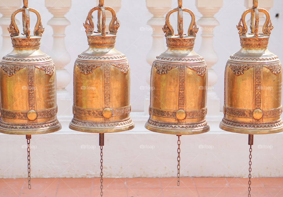 row of gold bell in Buddhist temple,Thailand