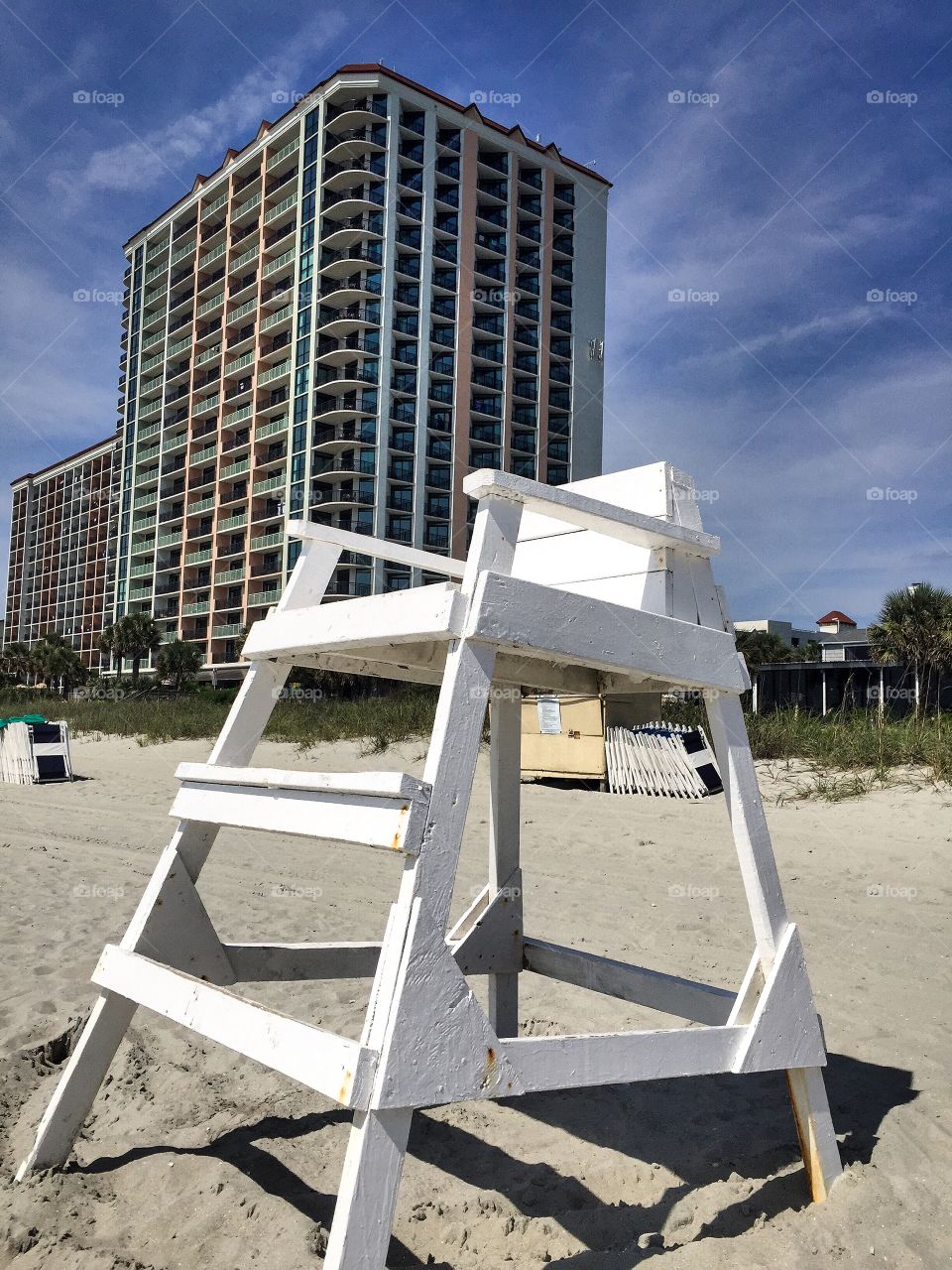 Beach. As summer comes to an end a empty lifeguard chair stands alone in Myrtle Beach South Carolina.