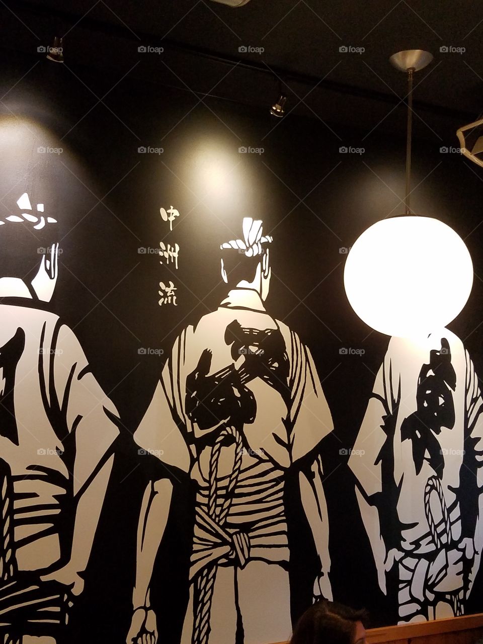 mural of sushi chefs