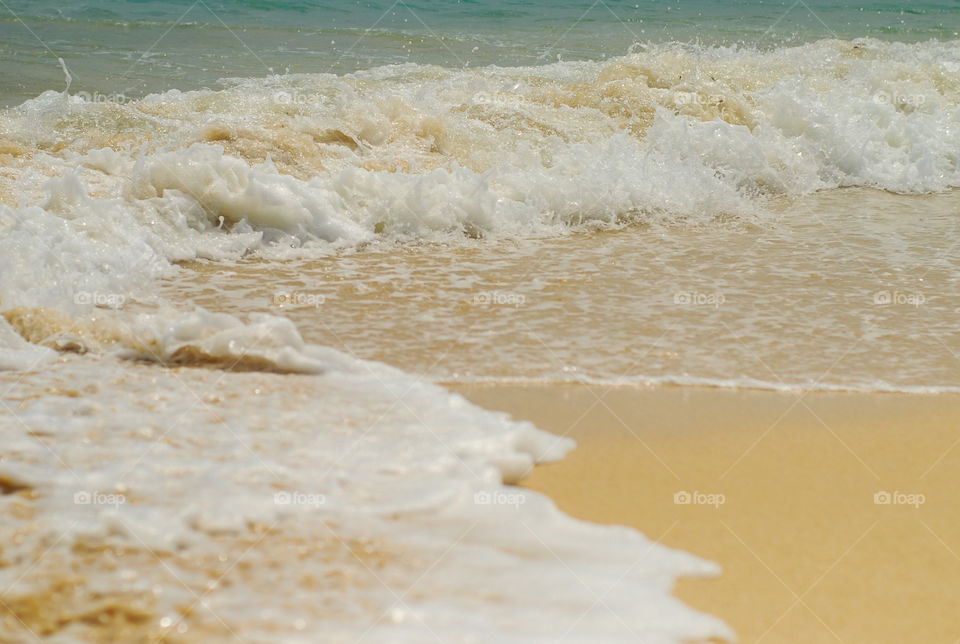 Water. Waves on the sand 