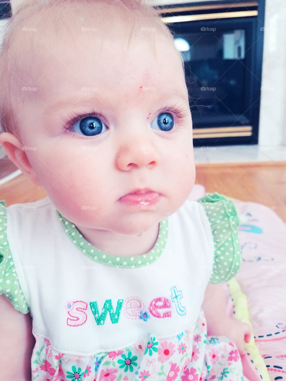 Close-up of a baby with blue eyes