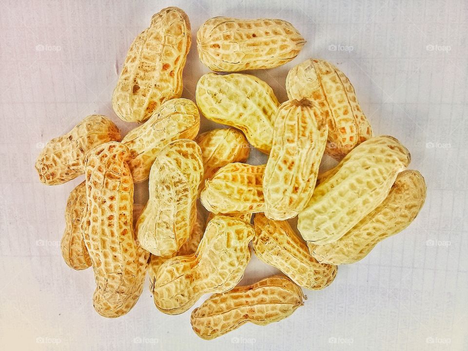 peanuts.many grow in tropical areas.peanuts can be processed into various products