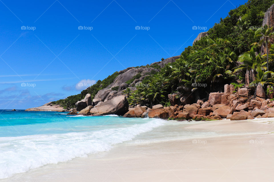 Beach turquoise water granite rocks