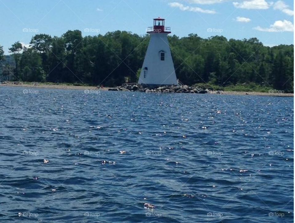 Lighthouse on the Bras d'or lakes in Baddeck, Nova Scotia. 