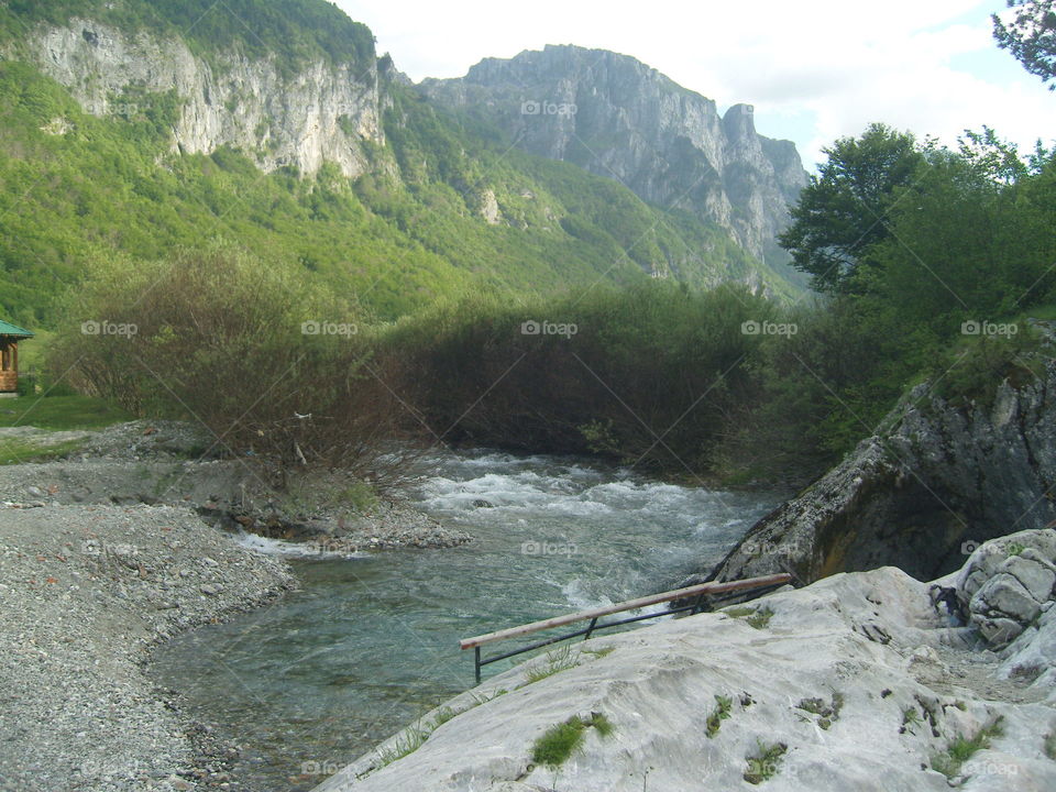 Mountain Prokletije Montenegro valley and river with distant mountain range