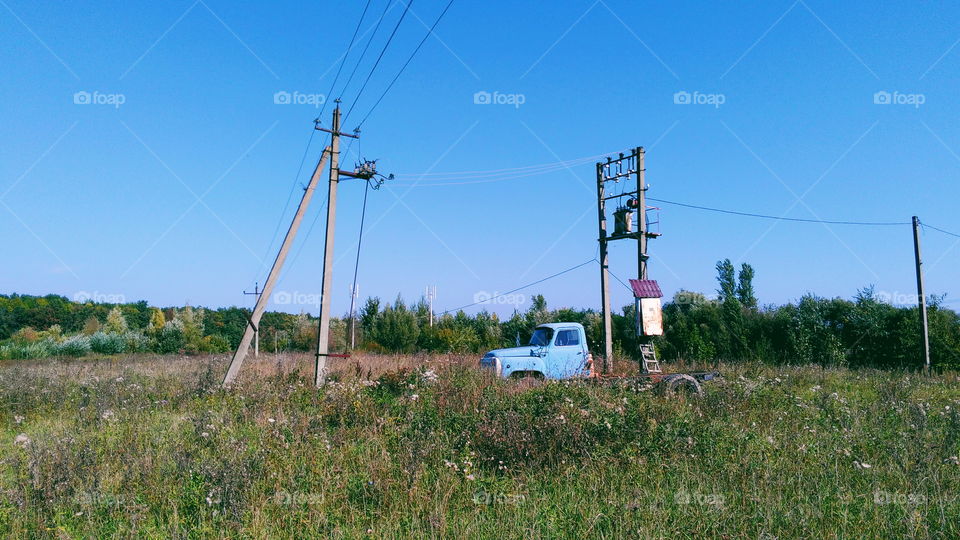 old broken truck in the field