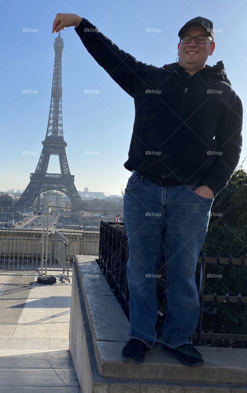 Pointing to Eiffel Tower