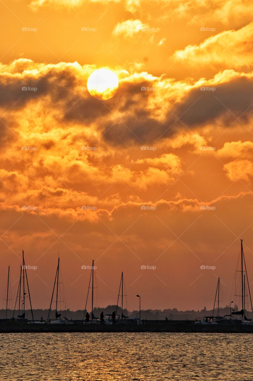 Harbour in sunny clouds