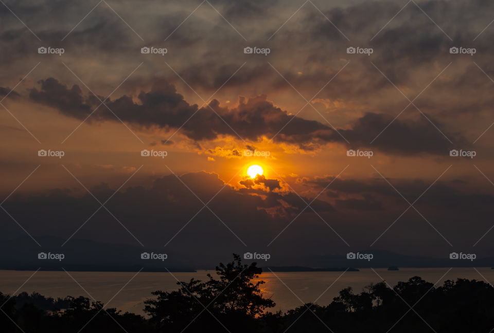 sunrise over Si Nakharin dam at Huay Mae khamin waterfall Nation