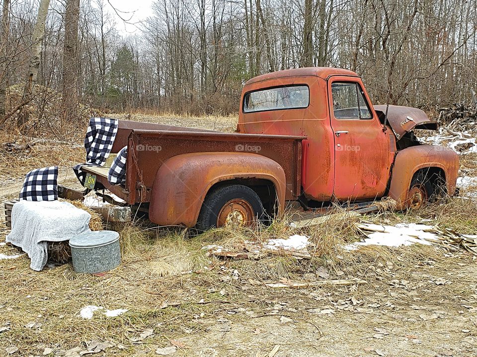vintage truck with buffalo checked pillows