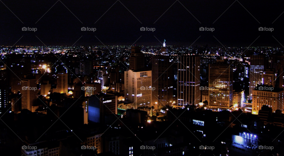 city buildings night high by riksen
