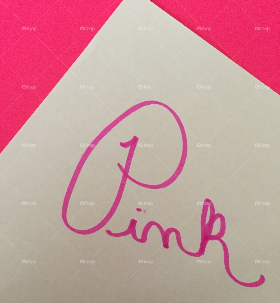 The word pink on paper