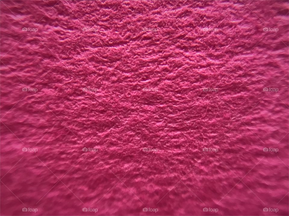 Pink leather close-up texture 