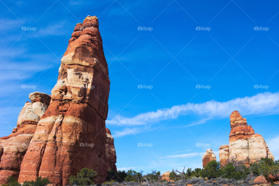 Sandstone spires extend from the desert floor.