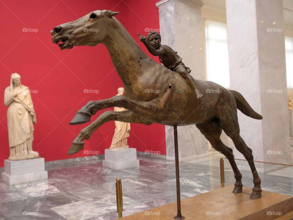 Boy on horse statue 