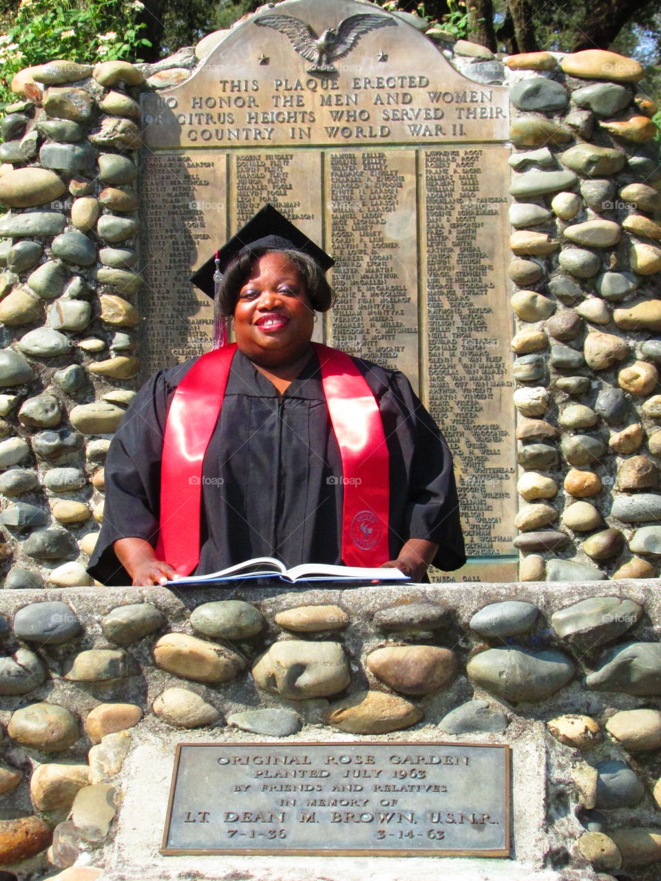 graduate in cap and gown