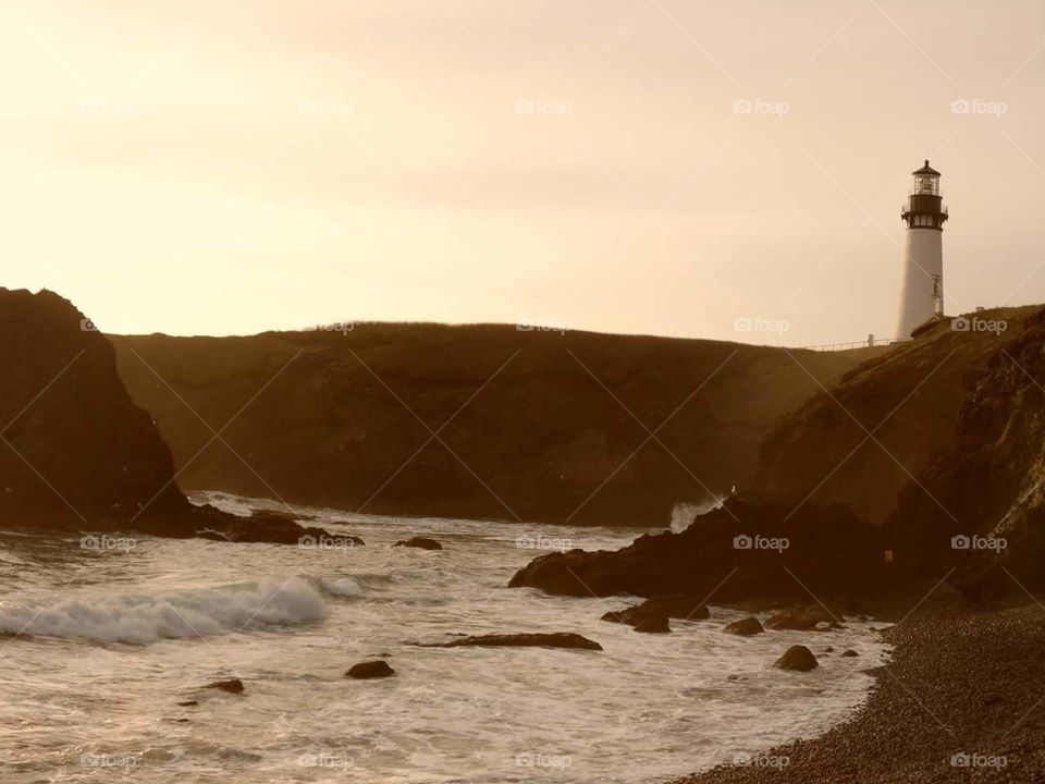 lighthouse shoreline. lighthouse in Oregon