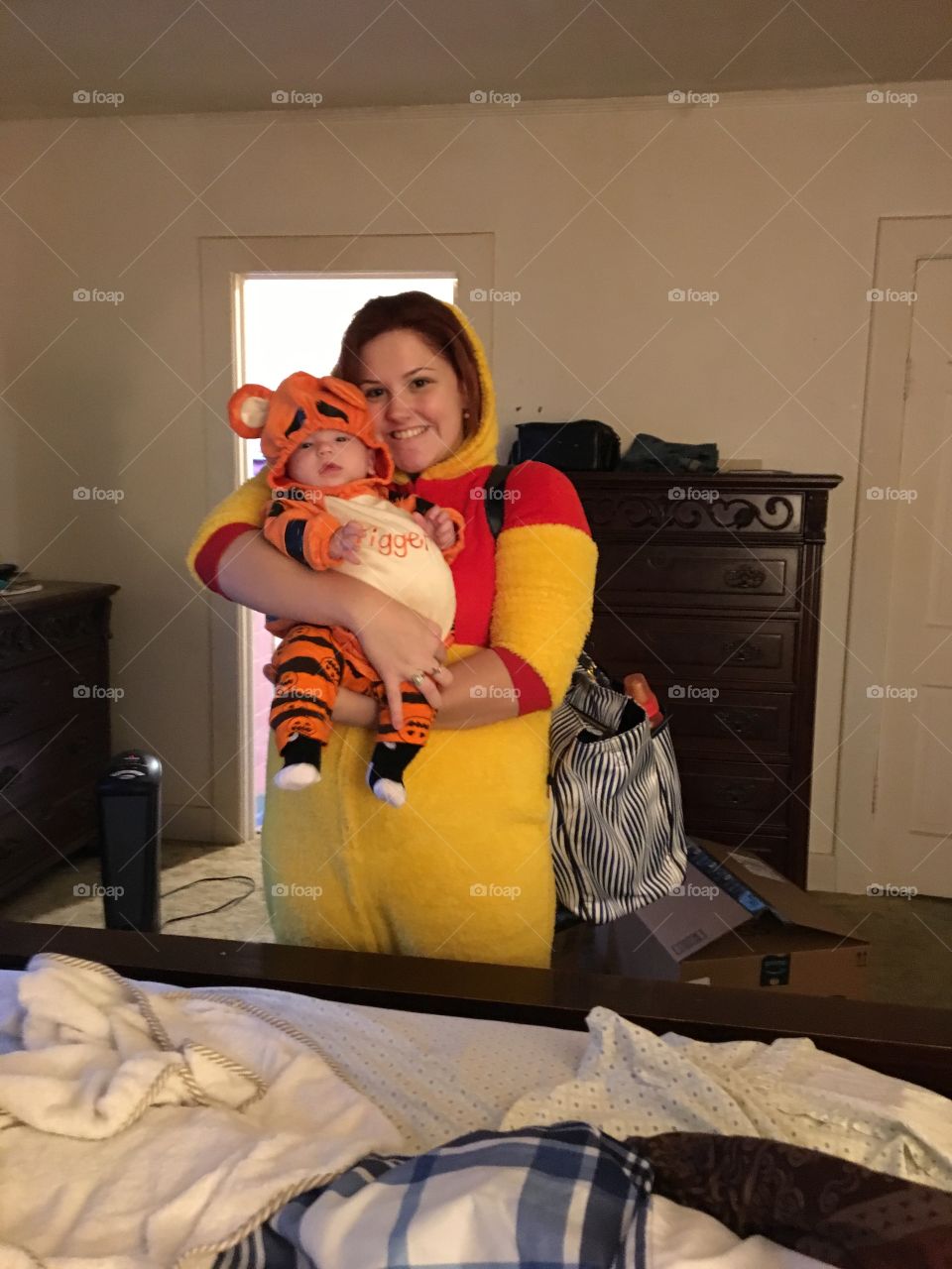 My grandson and my daughter dressed up for Halloween.My daughter's Winnie the Pooh.My grandson is Tigger! Very adorable Mother and Son!