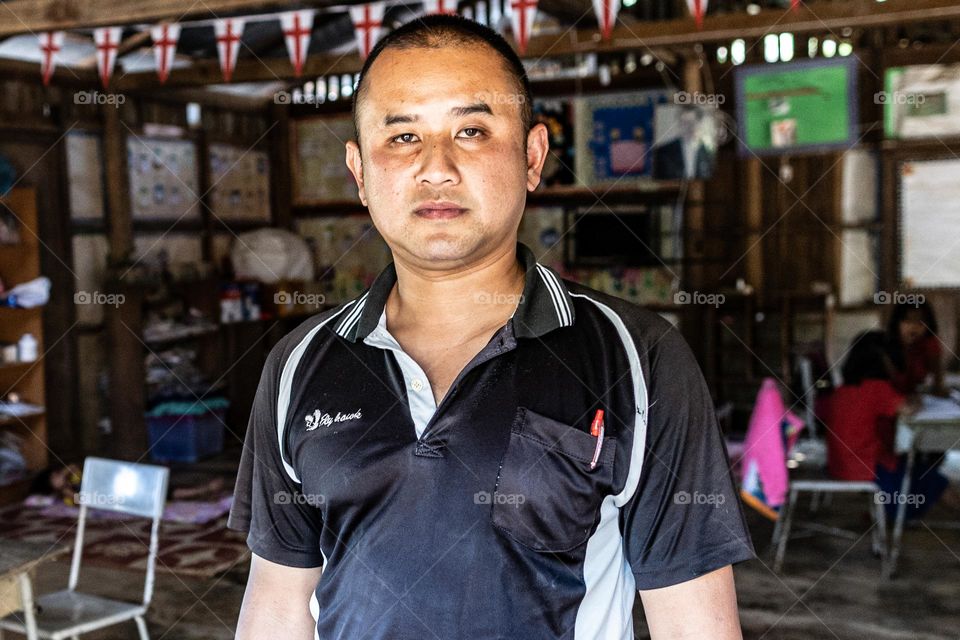 Teacher's face in Thailand's far remote area