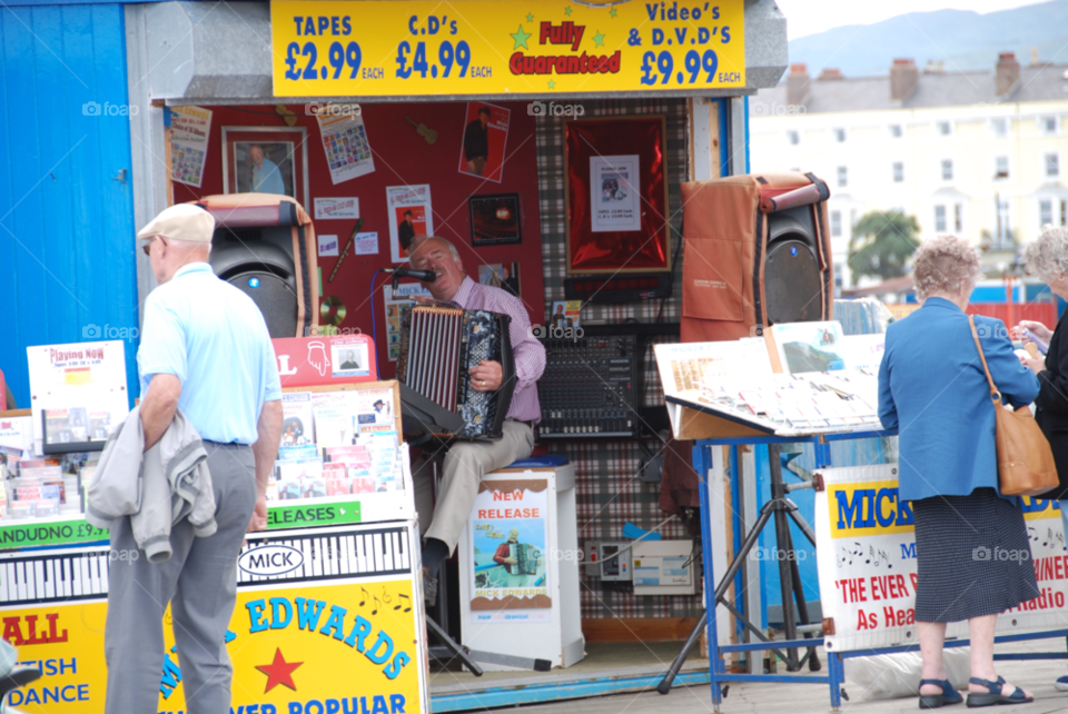 llandudno pier north wales busy accordion music kiosk by PhilC