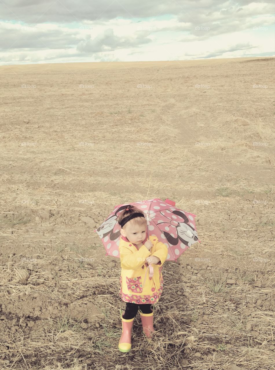 Girl holding umbrella