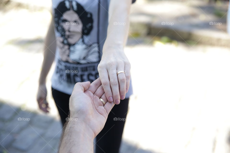 Holding hands.