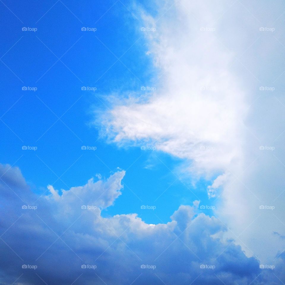 Blue sky, white clouds.