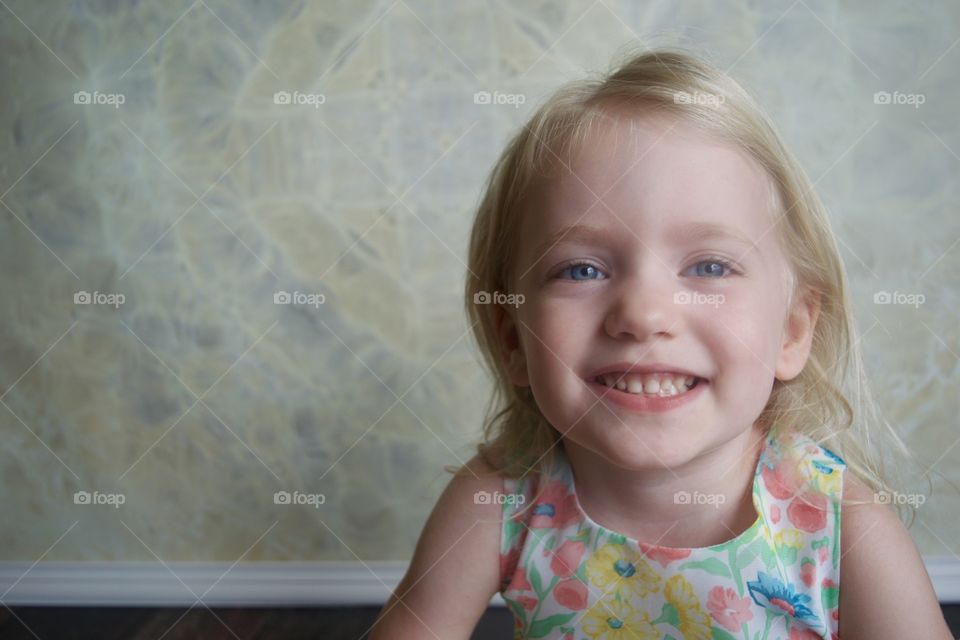Close up studio portrait of little girl