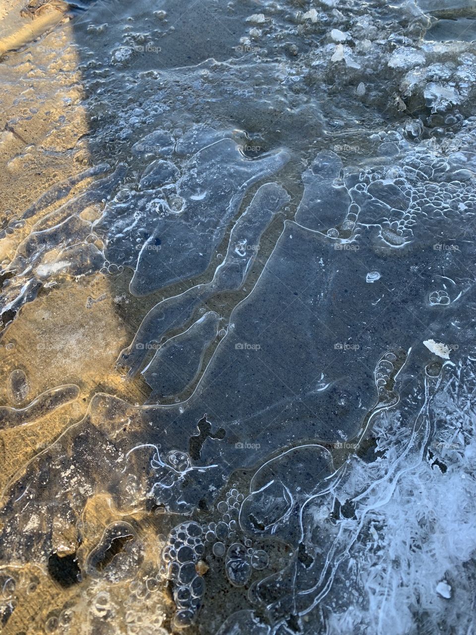 Water flowing under ice 