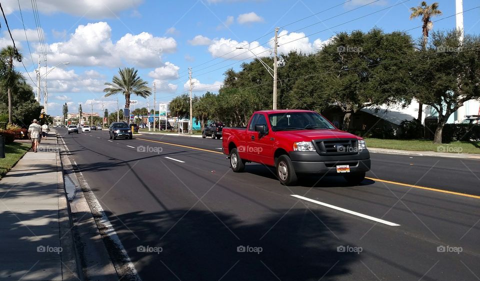 FORD rolling down Gulf Blvd.. Walking against traffic on Gulf Blvd. in St. Pete's.