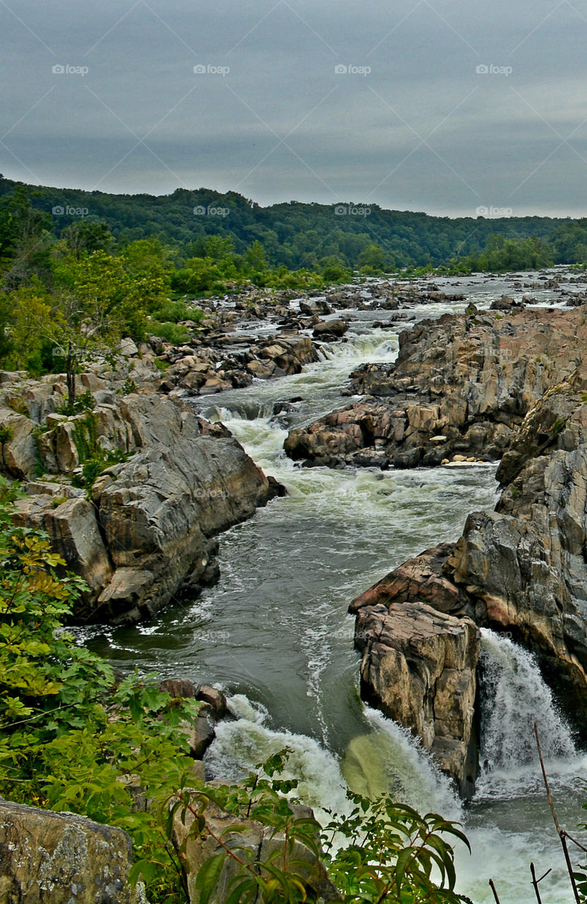 Water rushing between the rocks! Water, Water, everywhere! I just happen to be fortunate enough to live in a state that has approximately 12,000 square miles of beautiful, refreshing, colorful oceans, rivers, lakes, ponds and swamps!