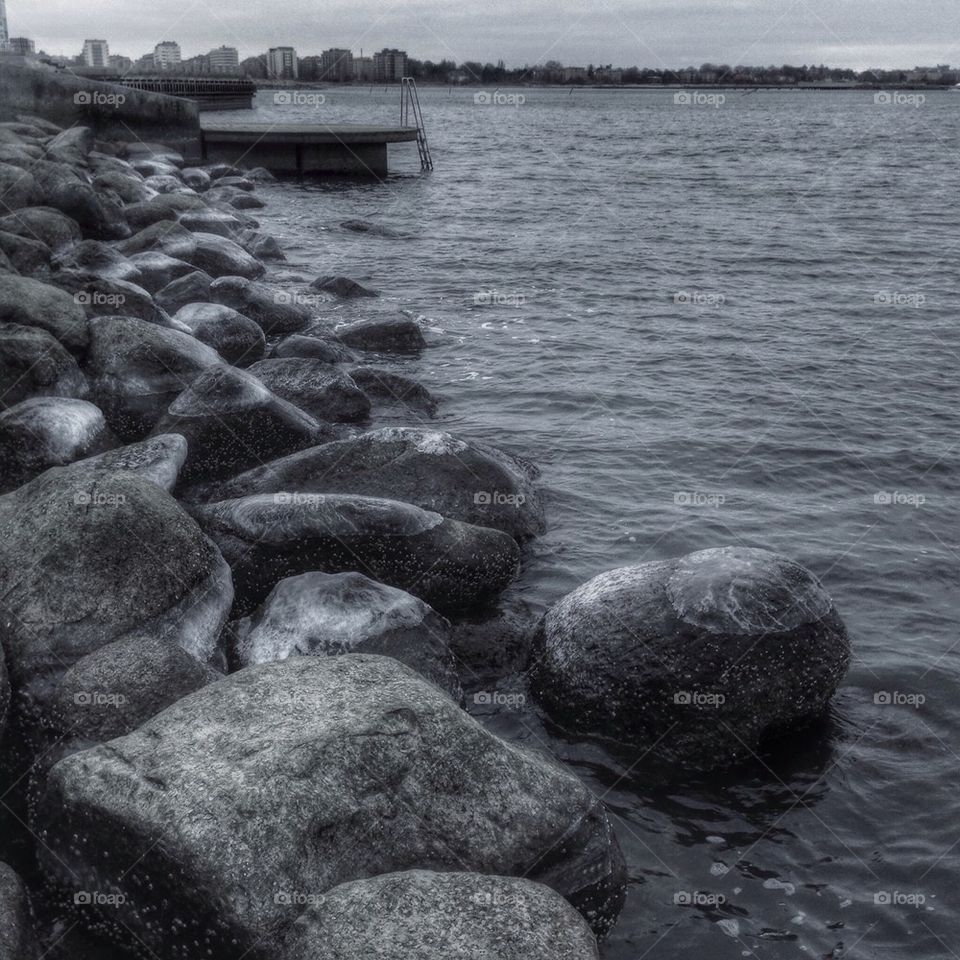 Pile of stones at lake