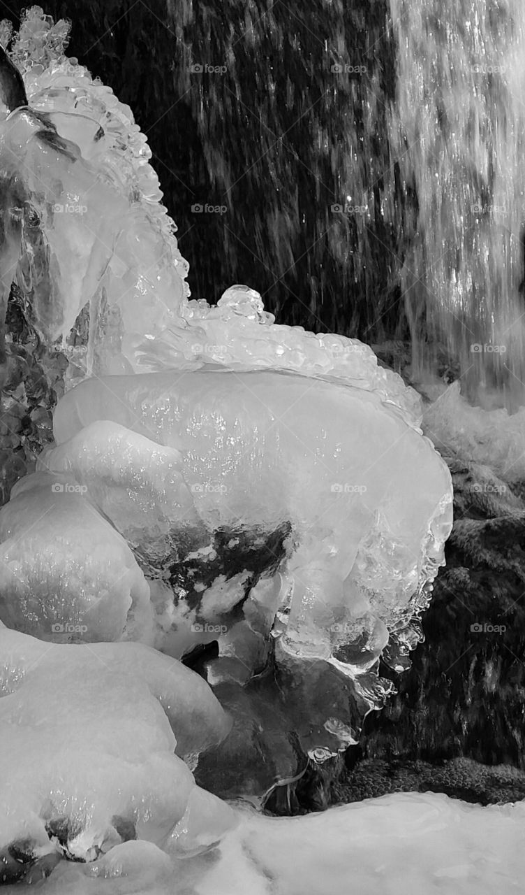 Frozen water by a waterfall