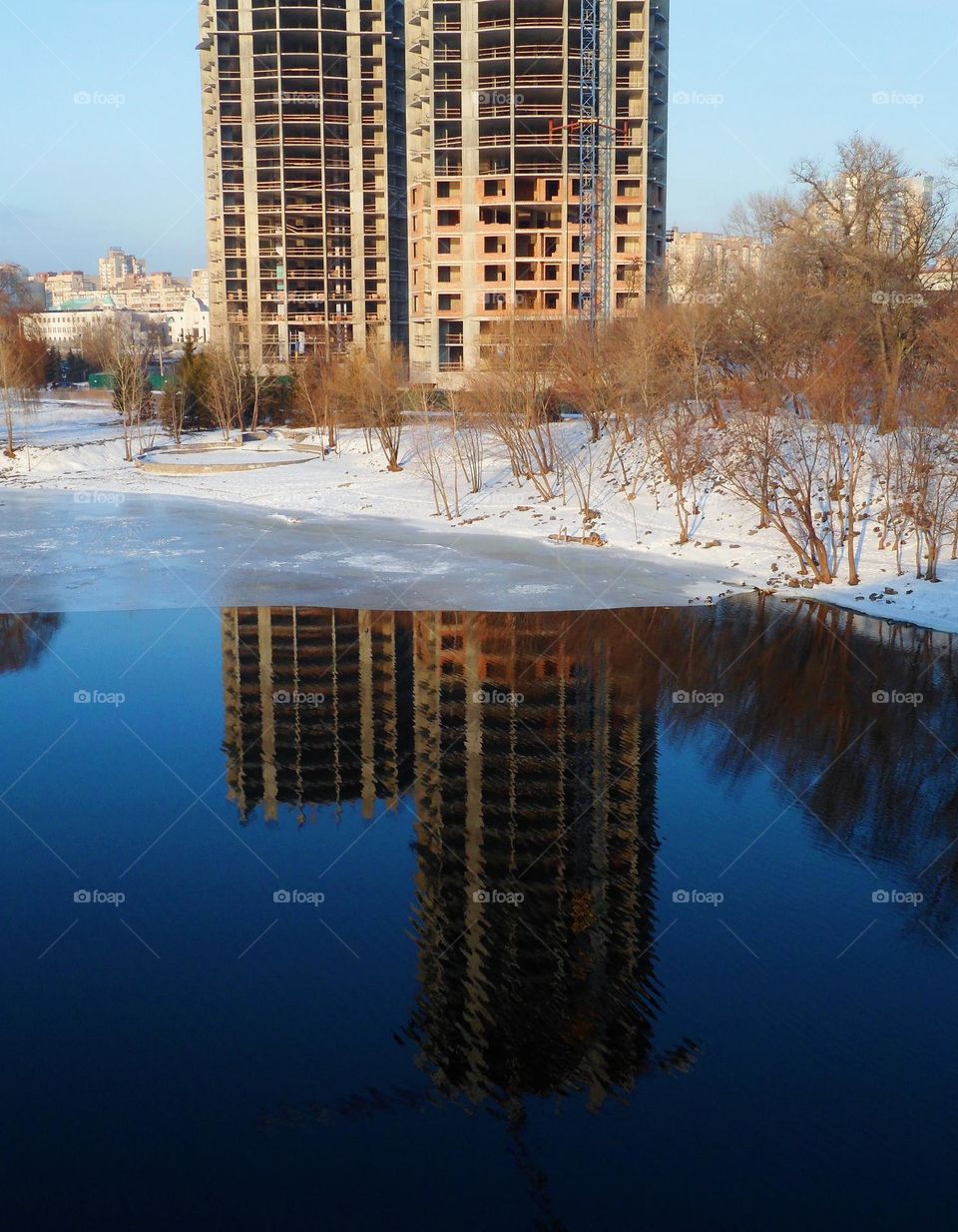 mirror reflection on the water of the houses