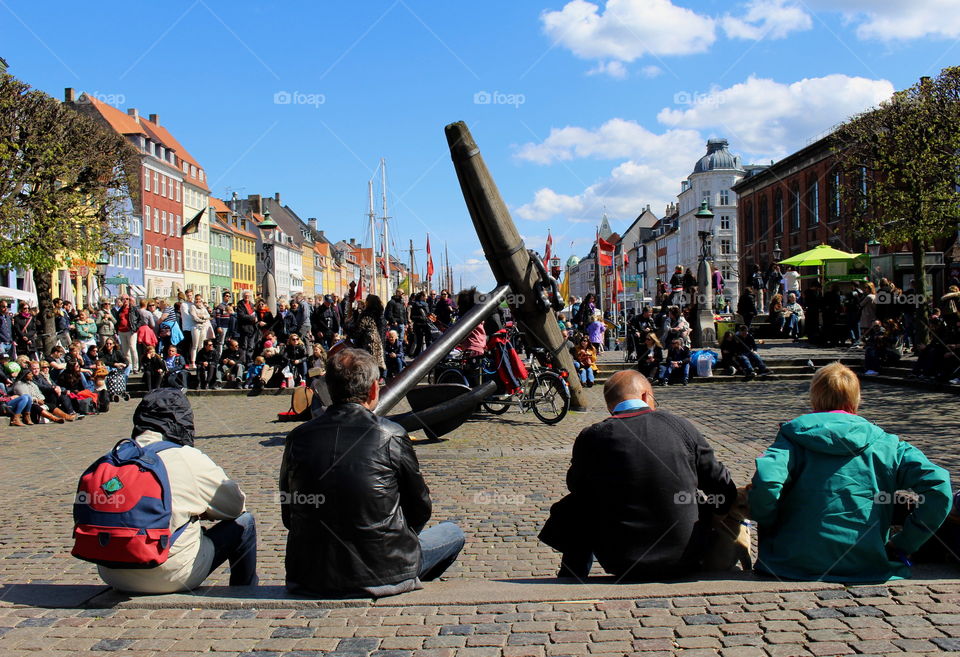 People enjoying Nyhavn, Copenhagen.. People enjoying Nyhavn, Copenhagen.