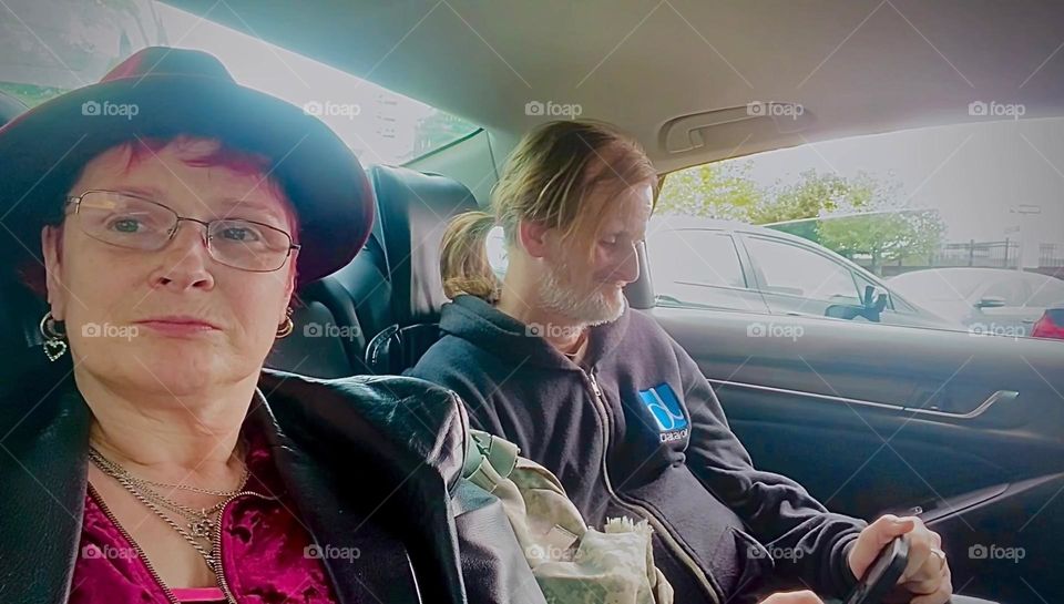 „Timothy Trespas“, my significant other and I, „Petra Schiller“ a.k.a. „Maxine Firefox“ or „Maximilliane Feuerfuchs“ are riding in a limousine together from „Clinton Hill“, Bklyn to LIC, Queens. 2022. Hypnotic Productions