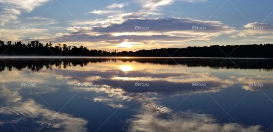 Northwoods sunrise over the lake.