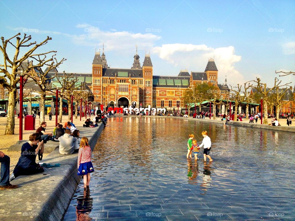 Playing in Park Water. Children play in a pool in Amsterdam