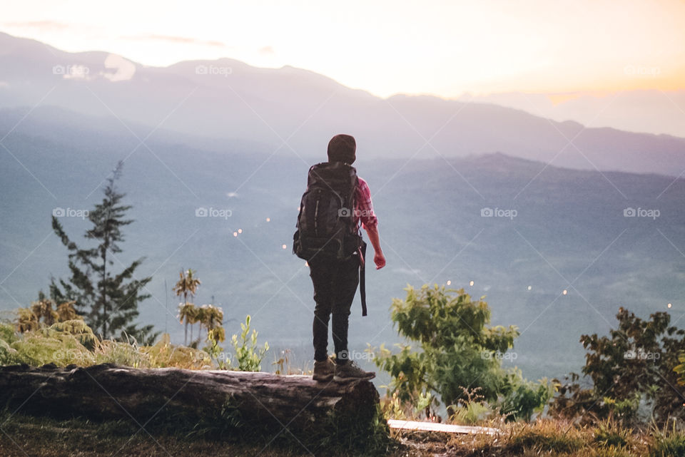 Boy enjoying nature on the mountain