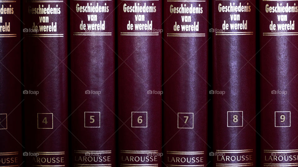 Encyclopedia on a shelf.