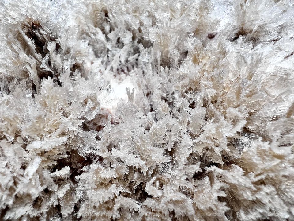 Macro photo of frozen chocolate ice cream in full framed.