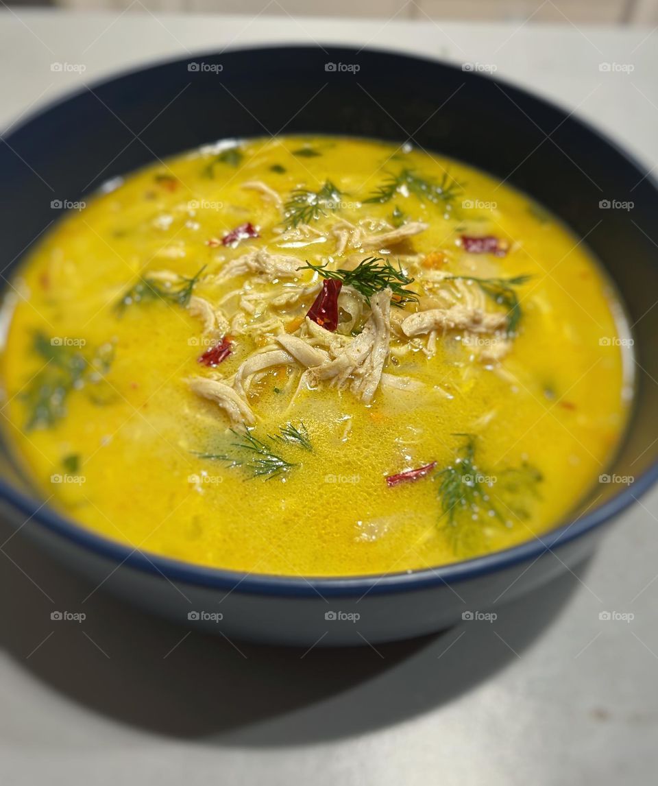 Golden Turmeric chicken soup with coconut milk for cold winter nights 