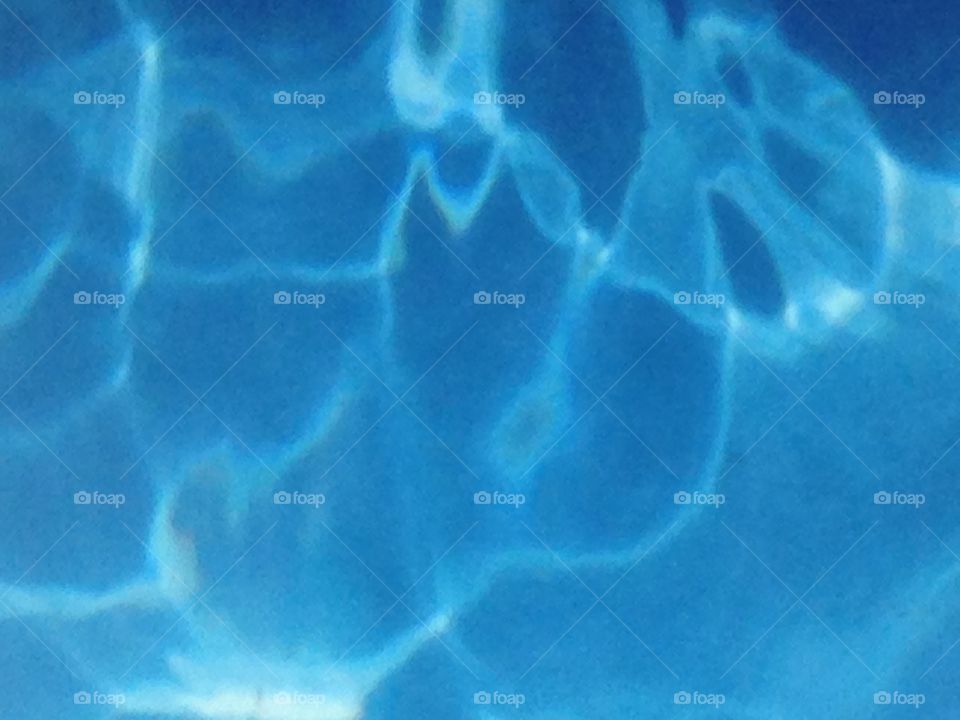Swimming pool water ripple aqua blue background