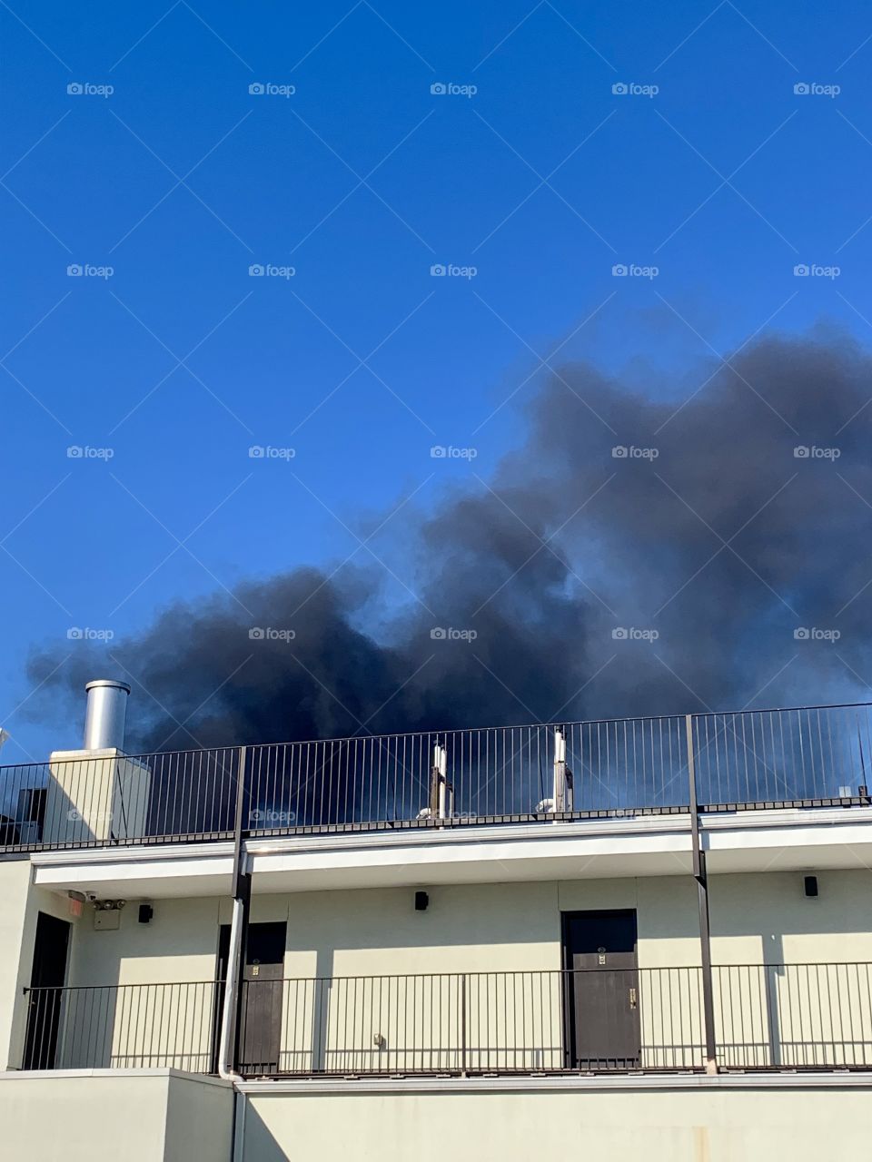 Black smoke from house fire