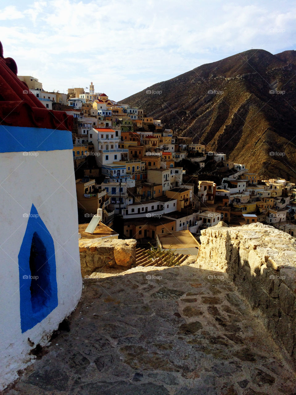 Houses on a cone. mountain cone